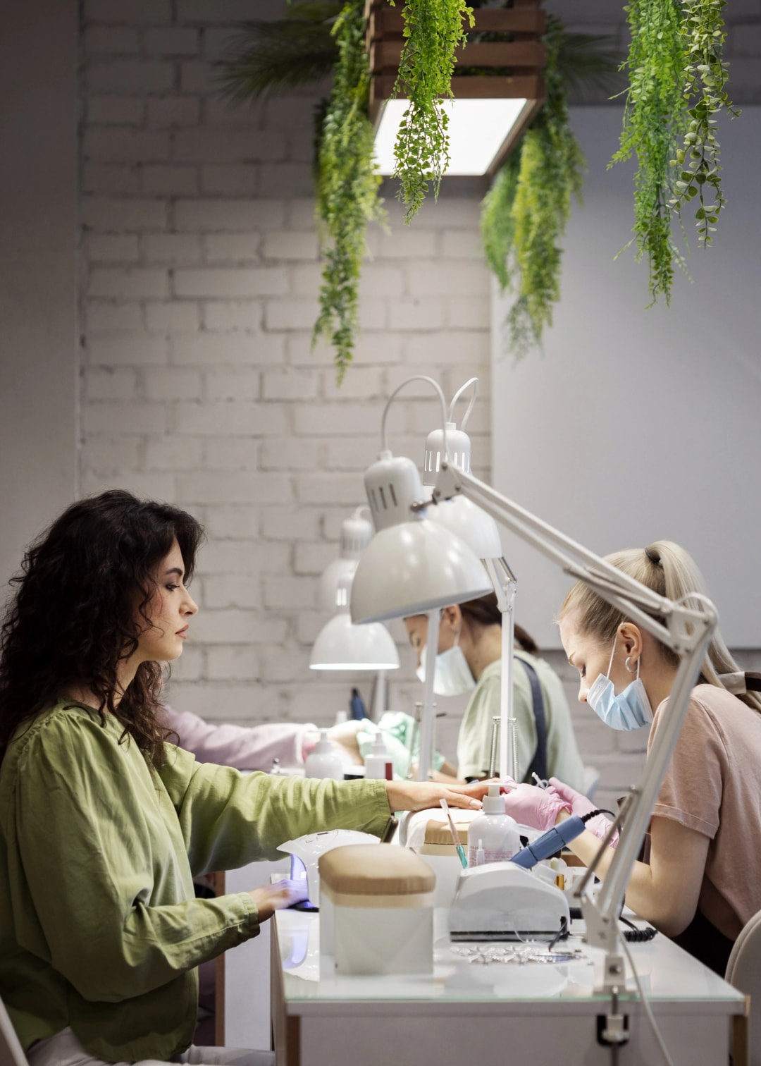 nail-art-professional-working-client-nails.webp