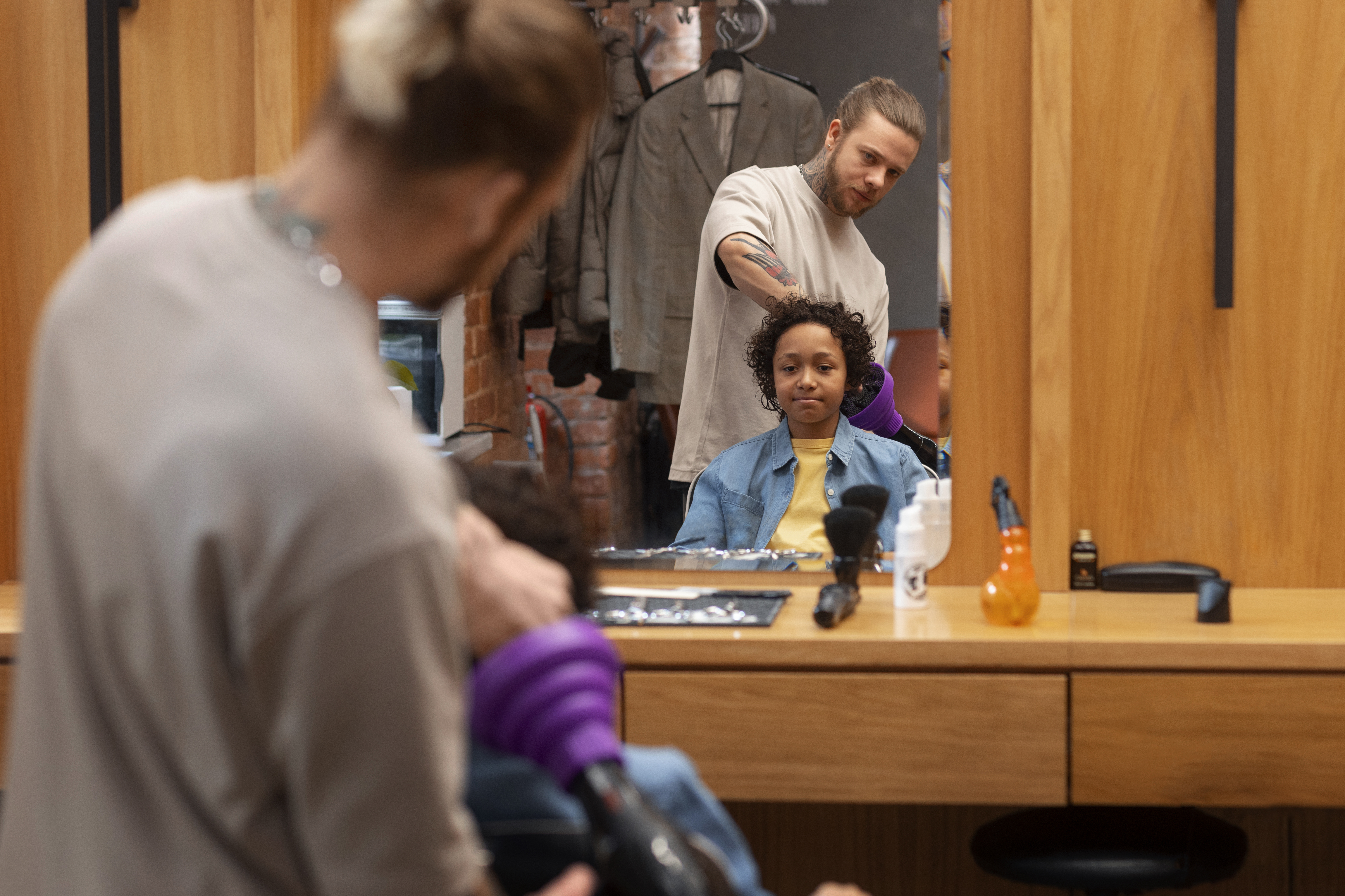 child-getting-their-hair-blown-salon